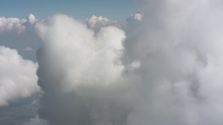 4K stock footage aerial video fly over a cloud formation high above Ohio farmland Aerial Stock Footage | WA005_073