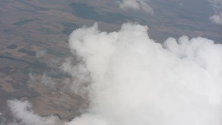 4K stock footage aerial video of flyby the edge of a cloud over Ohio farmland Aerial Stock Footage | WA005_074