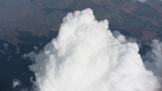 WA005_083 - 4K stock footage aerial video tilt from a bird's eye view of farm fields to approach clouds in Ohio