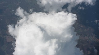 4K stock footage aerial video of a reverse view of a white cloud over Ohio farm fields Aerial Stock Footage | WA005_084