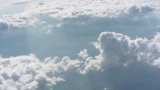 WA005_087 - 4K stock footage aerial video tilt to clouds high above West Virginia farmland and river