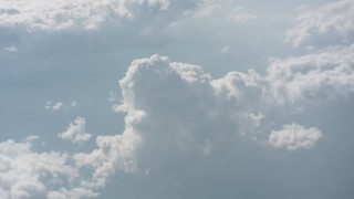 WA005_088 - 4K stock footage aerial video flyby a large cloud formation high above West Virginia