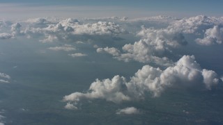 WA005_096 - 4K stock footage aerial video tilt from a bird's eye of mountains to a view of clouds above West Virginia