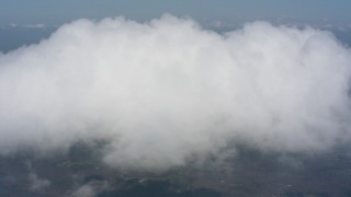 4K stock footage aerial video approach and flying over a cloud above rural Virginia towns Aerial Stock Footage | WA006_010