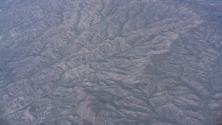 WA007_032 - 4K stock footage aerial video of desert mountains in The Badlands, California