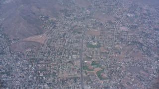 WA007_041 - 4K stock footage aerial video flyby suburban neighborhoods in Riverside, California