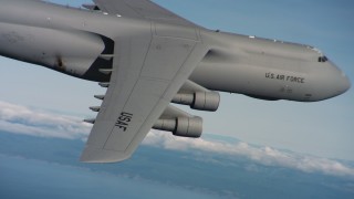 4K stock footage aerial video of a Lockheed C-5 flying near the coast in Northern California Aerial Stock Footage | WAAF01_C063_0117RC