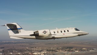 4K stock footage aerial video of a Learjet C-21 near Travis Air Force Base, California Aerial Stock Footage | WAAF02_C063_01178T