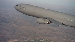 4K stock footage aerial video of a McDonnell Douglas KC-10 flying over hills in Northern California Aerial Stock Footage | WAAF03_C007_01183X