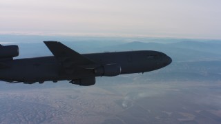 4K stock footage aerial video of a McDonnell Douglas KC-10 flying away in Northern California Aerial Stock Footage | WAAF03_C016_0118KH