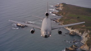 4K stock footage aerial video of a reverse view of a McDonnell Douglas KC-10 flying by the coast of Northern California Aerial Stock Footage | WAAF03_C053_01188P