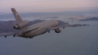 4K stock footage aerial video of a McDonnell Douglas KC-10 approaching San Francisco, California at sunset Aerial Stock Footage | WAAF03_C058_0118S0