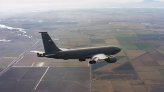 WAAF04_C097_0118ED - 4K stock footage aerial video of a Boeing KC-135 near Travis Air Force Base, California