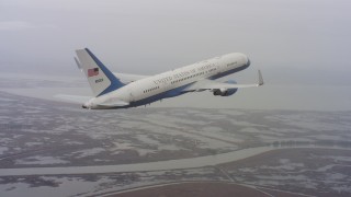 4K stock footage aerial video of a Boeing C-32 ascending over wetlands in Northern California Aerial Stock Footage | WAAF08_C003_011949