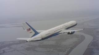 4K stock footage aerial video of a Boeing C-32 in flight over wetlands in Northern California Aerial Stock Footage | WAAF08_C003_011949_S000