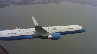 4K stock footage aerial video of a Boeing C-32 flying over a bay in Northern California Aerial Stock Footage | WAAF08_C004_0119W6