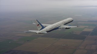 4K stock footage aerial video of flying around the tail of a Boeing C-32 over farms in Northern California Aerial Stock Footage | WAAF08_C016_0119WF