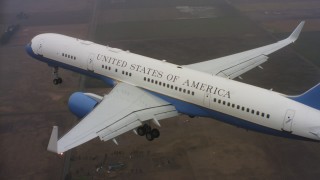 4K stock footage aerial video of a Boeing C-32 approaching Travis Air Force Base, California Aerial Stock Footage | WAAF08_C033_0119BG