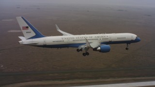 4K stock footage aerial video of a Boeing C-32 approaching Travis Air Force Base, California Aerial Stock Footage | WAAF08_C034_0119DF