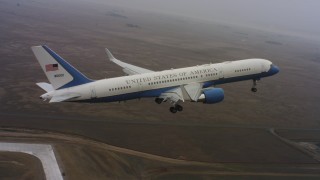 WAAF08_C034_0119DF_S000 - 4K stock footage aerial video of a Boeing C-32 lifting off from Travis Air Force Base, California