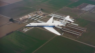 4K stock footage aerial video of Gulfstream C-37A over farms in Northern California Aerial Stock Footage | WAAF08_C060_0120A8